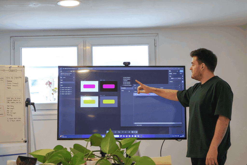 Team member showcasing example of a token design structure and how it works
